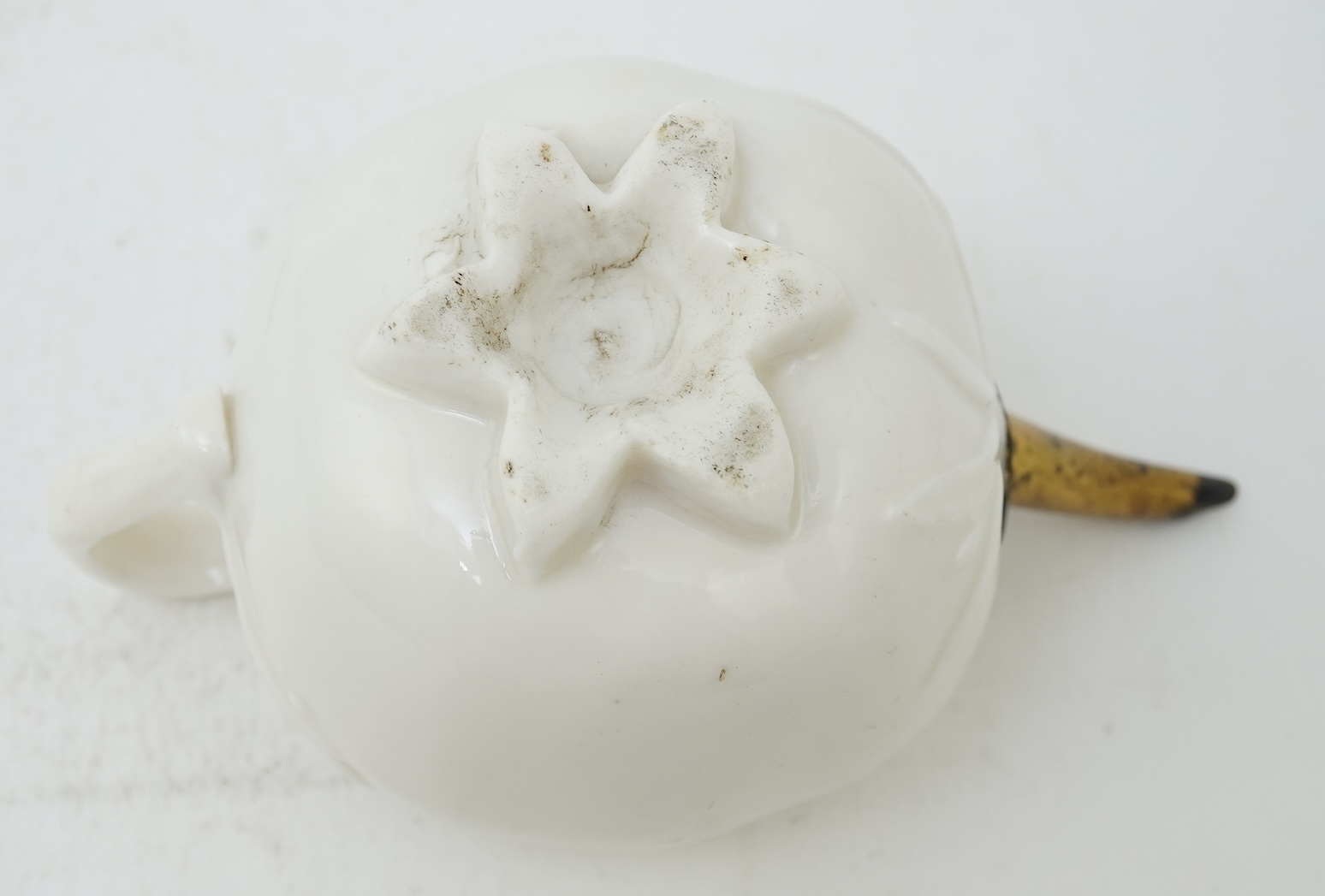 A Chinese Dehua blanc-de-chine ‘pomegranate’ teapot, mid 17th century
